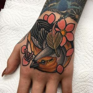 Hand tattoos by Mitchell Allenden #MitchellAllenden #handtattoos #color #neotraditional #bird #feathers #wings #cherryblossom #flower #floral #nature