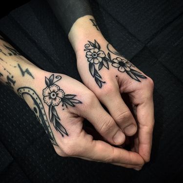 Flower tattoos by Tony Torvis #TonyTorvis #handtattoos #folktraditional #traditional #floral #pattern #ornamental #flower #daisy #leaves #nature