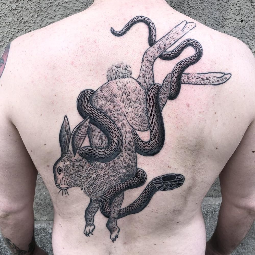 Snake and rabbit tattoo meaning