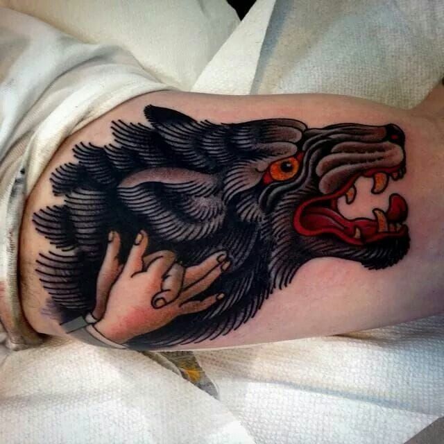 Neotraditional wolf tattoo on the chest