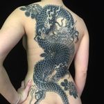 Tattoo by Sergey Buslay #SergeyBuslay #tattoodoambassador #Japanese #irezumi #blackandgrey #dragon #flowers #mums #floral #fire #folklore #mythicalcreature
