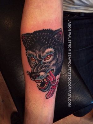 Traditional wolf tattoo