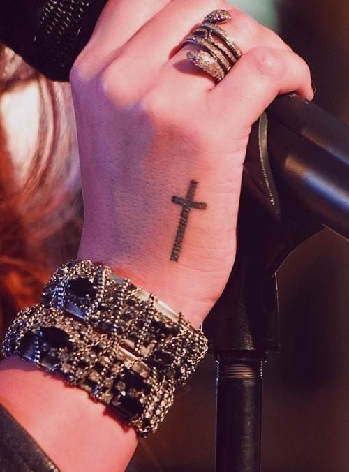 Symbolic cross tattoo