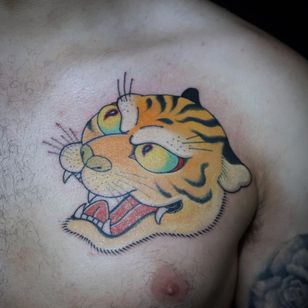 Tattoo by Ichi at Ichi Tattoo Studio - Tattooed Travels: Tokyo, Japan #TattooedTravels #Tokyo #Japan #tiger #cat #chestpiece #irezumi #Japanese