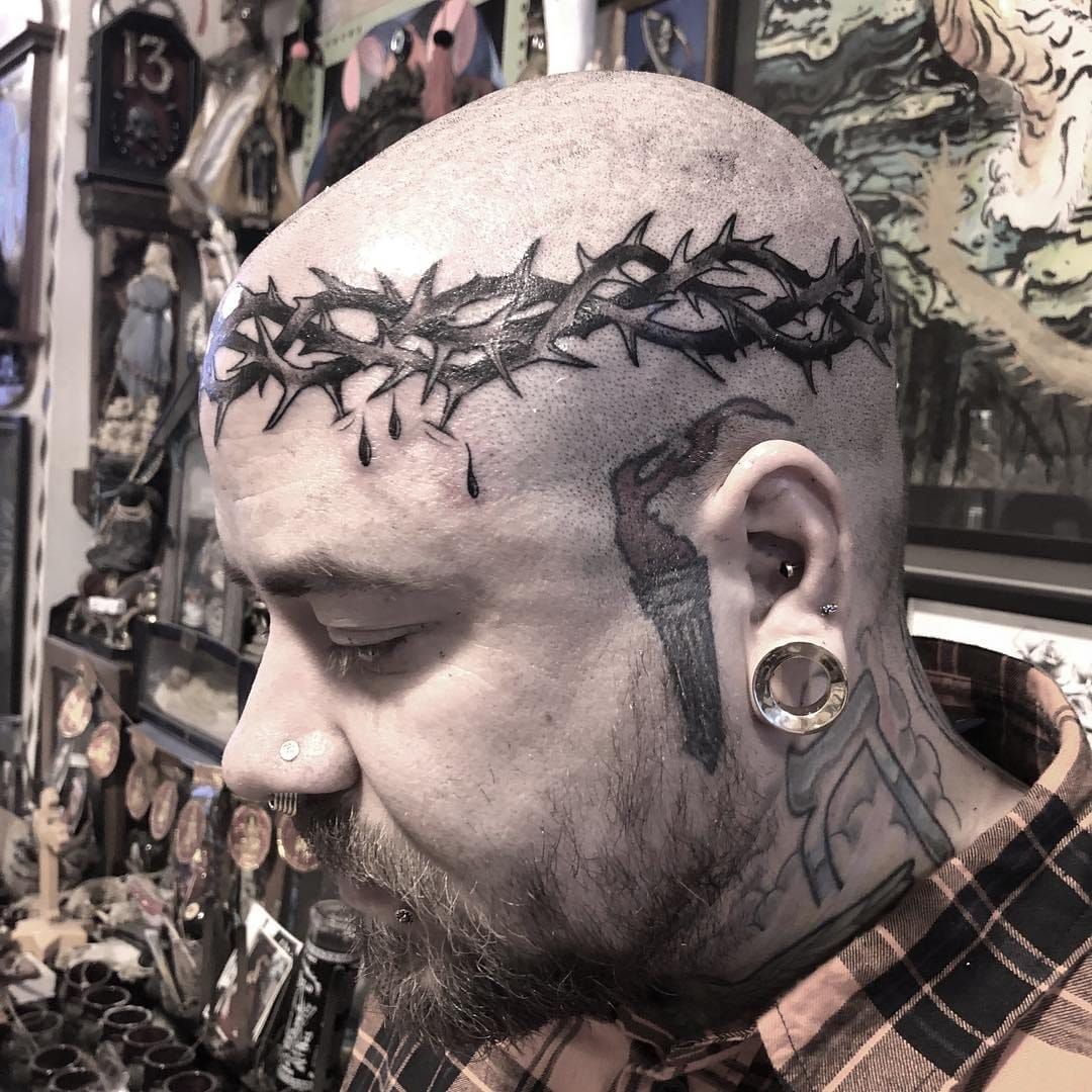 11 Crazy Forehead Tattoo Designs