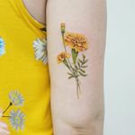 Birth month flower tattoo by Picsola #picsola #marigold #birthmonthflowertattoos #birthmonthflowers #flowertattoo #flowers #florals #petals #blooms #leaves #nature #plant #birthmonth