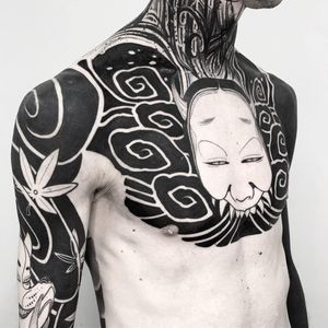 Chest and sleeve tattoos by Oscar Hove #OscarHove #torsotattoos #torso #bigtattoo #bigtattoos #bodysuit #blackwork #illustrative #mask #leaves #japanese #neojapanese #hannya #kitsune #clouds #darkart