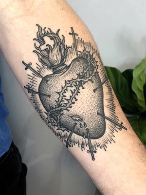 Sacred heart tattoo by Dukkha #Dukkha #forearm - Top 10 Cities to Get Tattooed In #NYC #NewYork #tattooidea #tattoo #tattooart #vacation #travel #top10 #top10cities #gettattooed