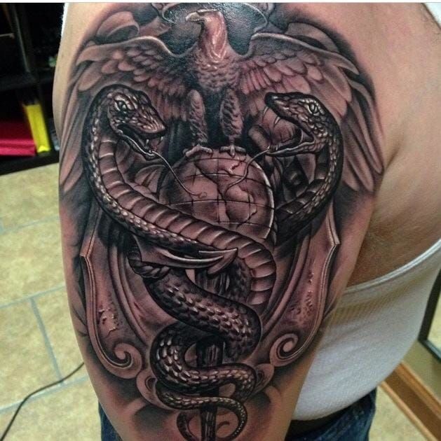 Caduceus tattoo for Ashley, thank ya! 🐍✨ . . . . . . . . . . . . . #tattoo  #snake #snaketattoo #caduceus #blackandgray #blackandgray... | Instagram