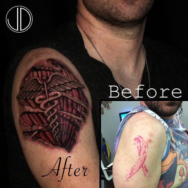 Ripped skin tattoo (cover-up) by JD Moore.