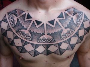 Great pectoral tattoo by Daniel DiMattia!