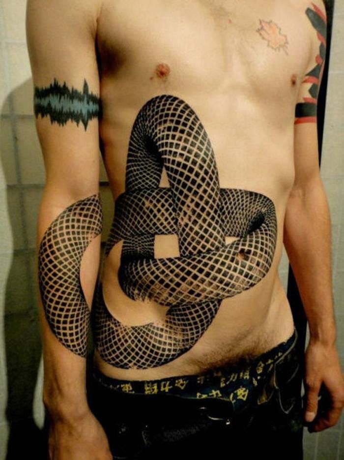 Other split tattoos by French tattoo artist Xoil.