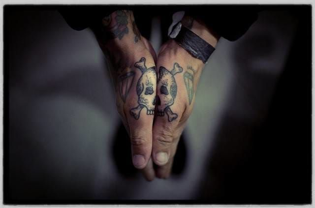 Old school hand skull by Hans Pasztjerik.
