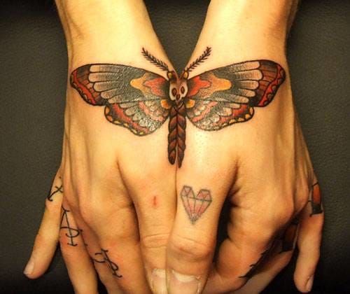 Butterfly tattoos, of course, are making great symmetrical split tattoos on hands.