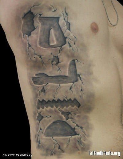 carved stone tattoo