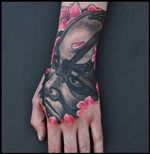 Great kabuki tattoo on the hand by Mike DeVries.