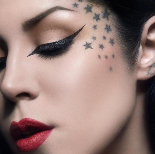 Premium Photo | Portrait woman with black ivy tattoo around her eyes with  rhinestones