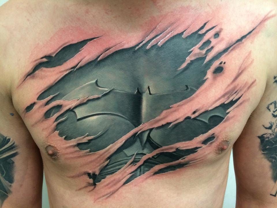 chest tattoo rip ripping through skin lion wolf tiger  Ripped skin tattoo Chest  piece tattoos Wolf tattoos