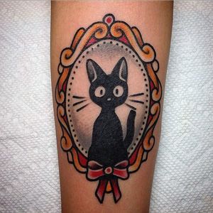 Cute black cat portrait tattoo