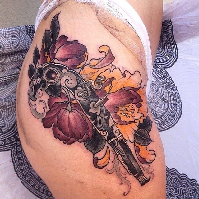 Realistic Flower Gun Tattoo by Westfall Tattoo