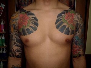 Chest arm by Tattoo Studio Shangri-La