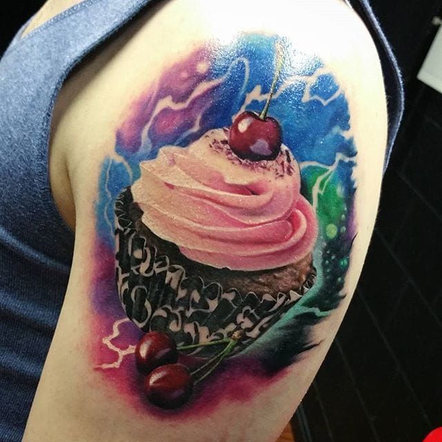 Right Hand Thumb Small Cupcake Tattoo