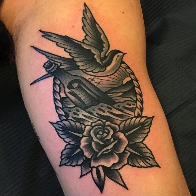 Old school bird and flower tattoo by Samuele Briganti