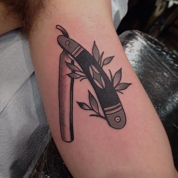 A Cool Straight Razor Tattoo by Matthew Houston