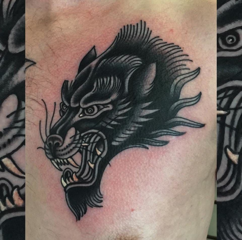 Fierce wolf head by North Sea Tattoo Company