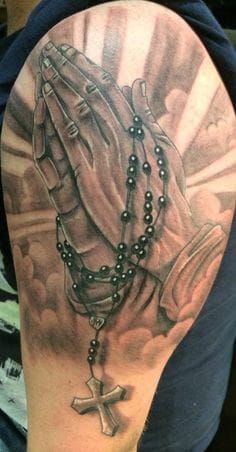 Praying hands tattoo looks awesome in black and grey. Detailed work by Ian Flynn #prayinghandstattoo #prayinghands #ianflynn