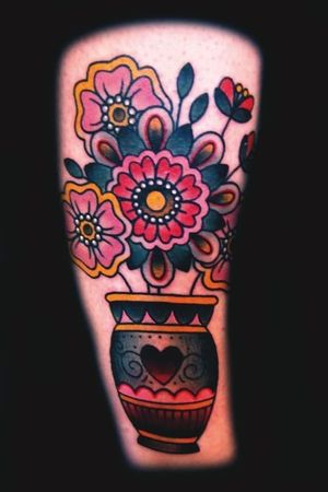 Ashley Love did this colorful thigh piece!!