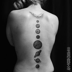Planets on spine by Kostyah Dvuhzerkalcev.