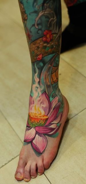 Lotus tattoo by Dmitriy Samohin