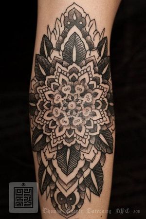 Mandala tattoo by Thomas Hooper