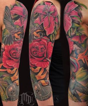 Floral tattoo sleeve by Mike Devries