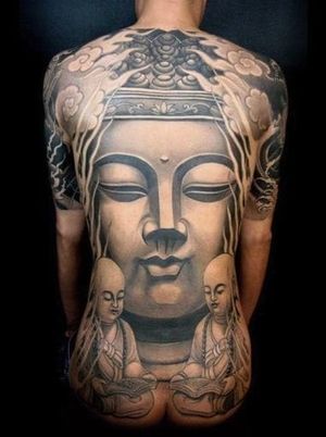 An enlarged and zoomed in image of Buddha brings a lot of visual impact as well. Cropping & placement is key. Don't be afraid to go for it! Beautiful Buddha tattoo #buddha