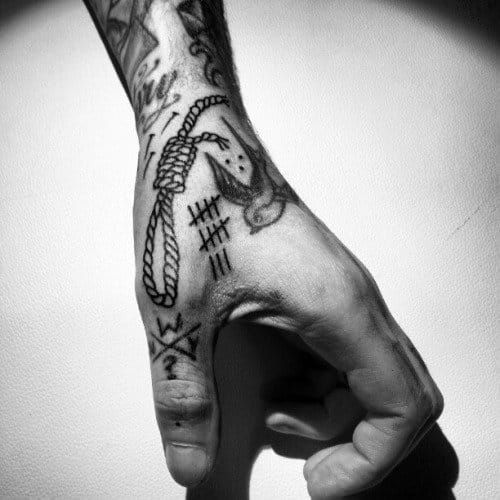 Prison Style Hand Tattoo, artist unknwon