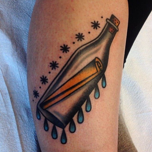 message in a bottle and songbird tattoo designs