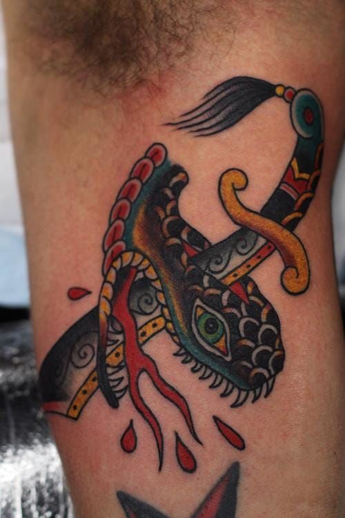 Tattoo of a snake head by alex batten  Black N Gold Legacy