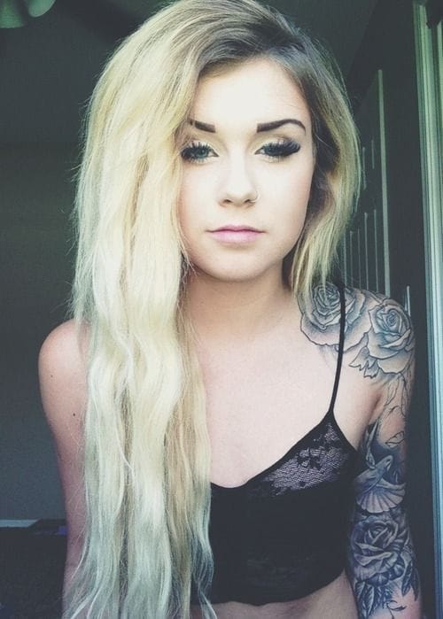 Pinterest.com. Delicate black and grey roses, equally bold and feminine. #femininetattoo #femininetattoos