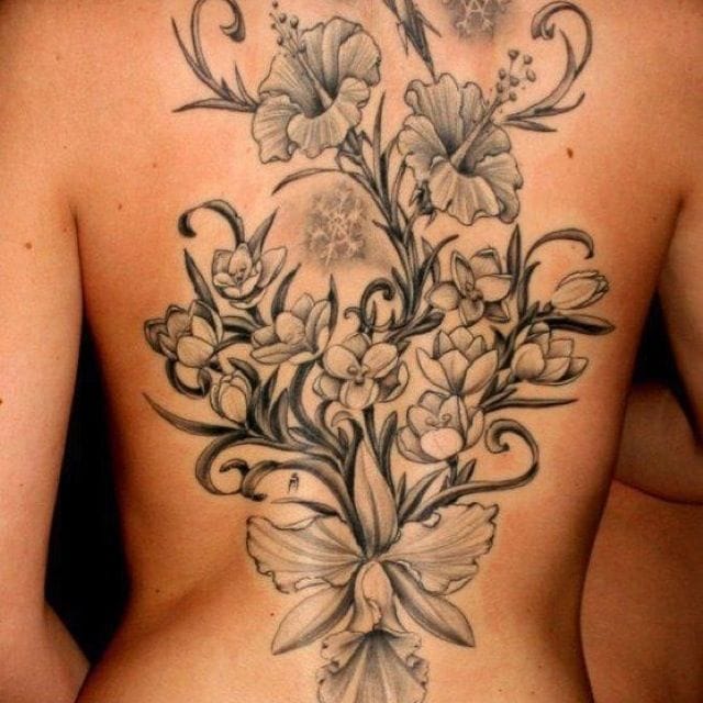 A softly styled full back tattoo, Pinterest.com. #femininetattoo #femininetattoos