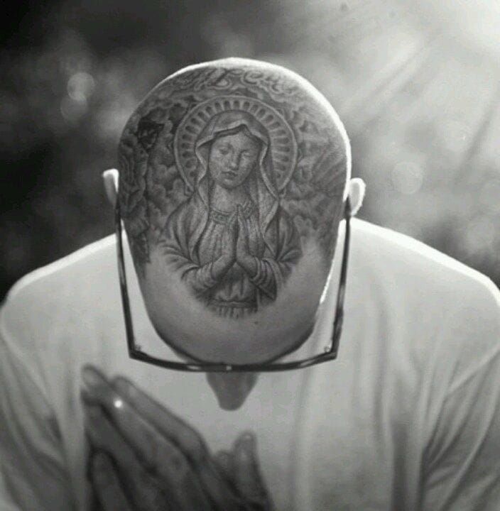 You already know the famous tattoo of Travis Baker by Mr Cartoon.