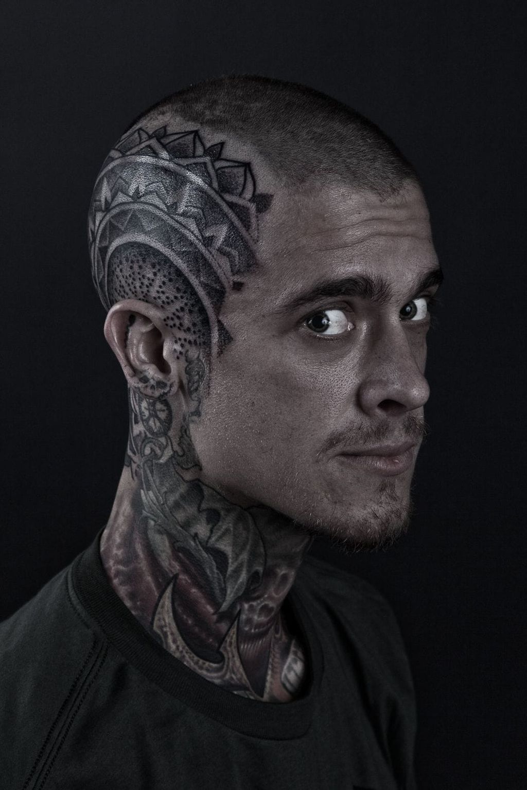 Here is tattoo artist Nathan Kostechko, tattooed by Hooper.