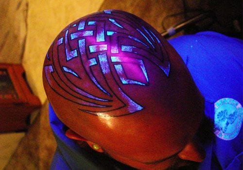 Blacklight tattoo in progress.