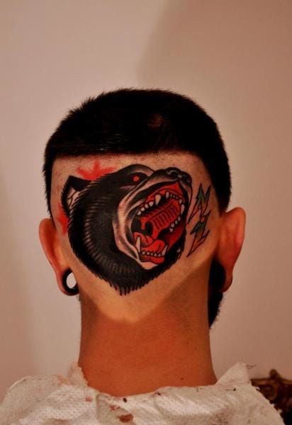 Neo traditonal bear by Raw tattoo.