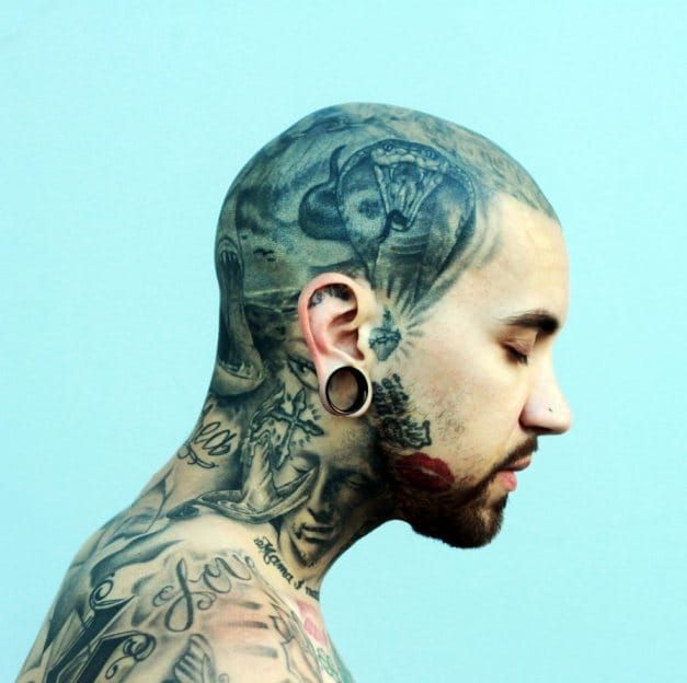 Tattoo artist Hi-Tone.
