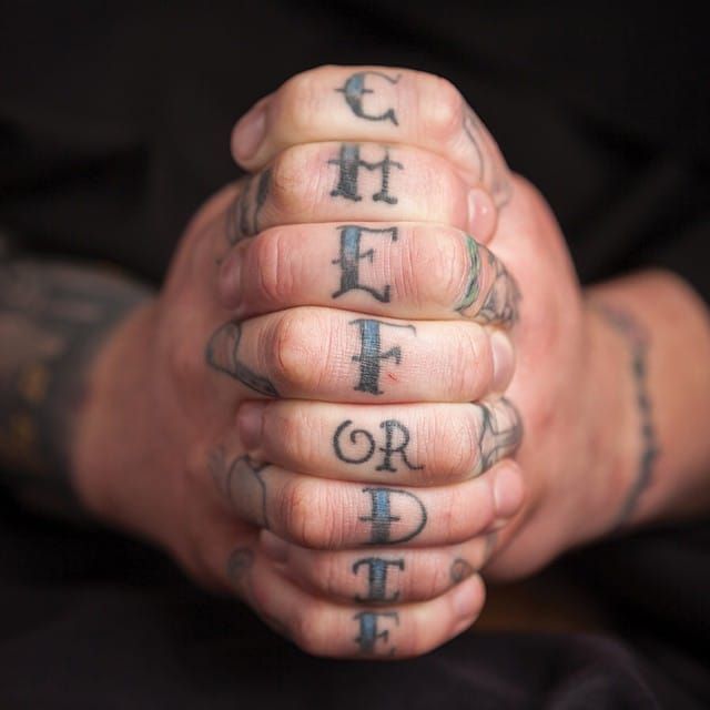 Badass knuckles tattoos