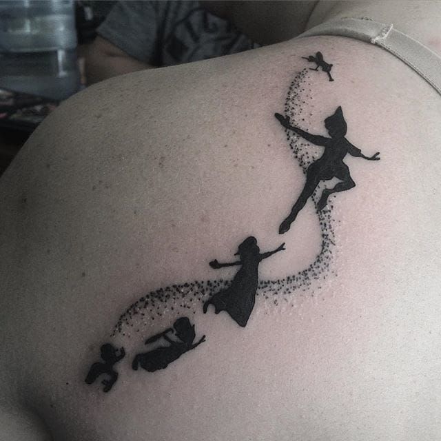 Blackwork pixie dust tattoo by Morgan Gatekeeper