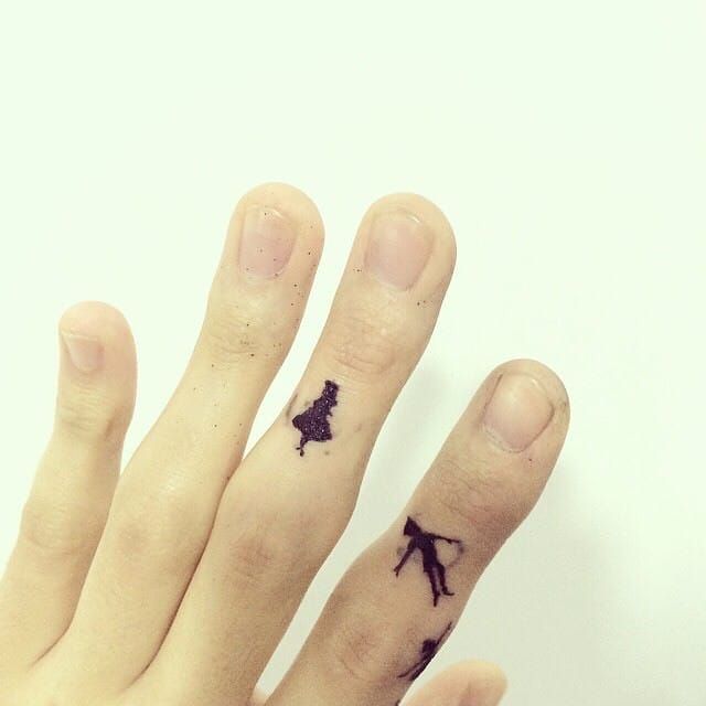 Peter Pan minimalist finger tattoos by hongdam