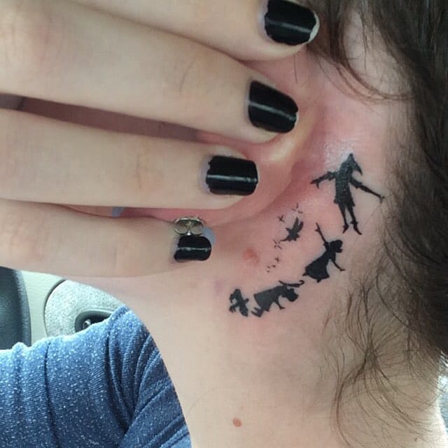 tinkerbell silhouette tattoo behind ear